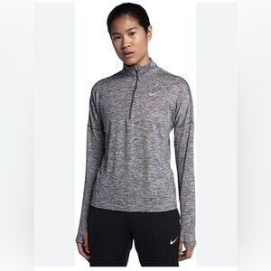 Women's Nike Dry Fit 3/4 zip up. Size M